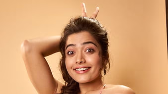 HD-wallpaper-actress-rashmika-mandanna-is-showing-victory-sign-on-head-girls-thumbnail