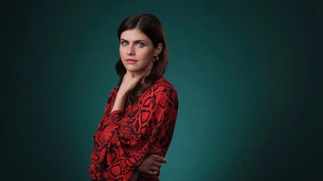 HD-wallpaper-alexandra-daddario-is-facing-one-side-wearing-red-and-black-dress-in-a-dear-teal-color-background-celebrities