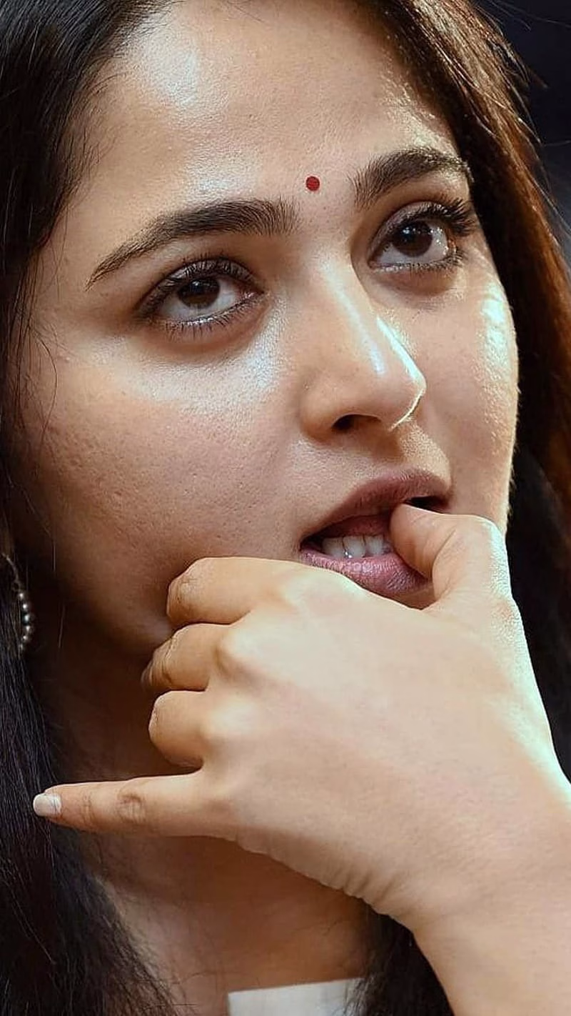 HD-wallpaper-anushka-shetty-telugu-actress-closeup-nailbiting