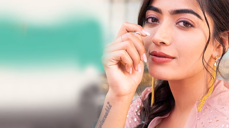 HD-wallpaper-beautiful-rashmika-mandanna-is-wearing-peach-color-dress-girls