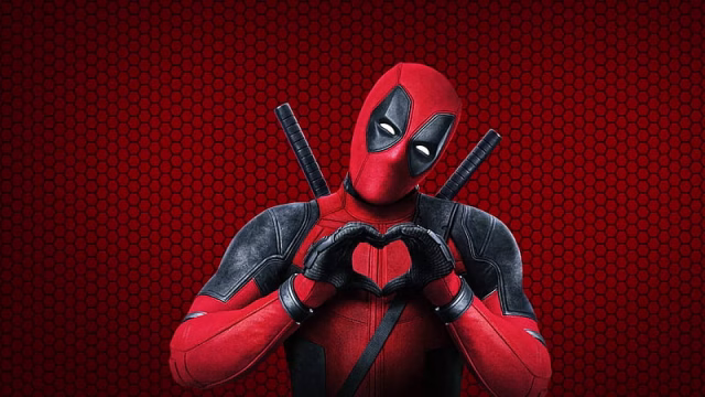 HD-wallpaper-deadpool-is-showing-heart-symbol-in-red-hexagon-background-deadpool