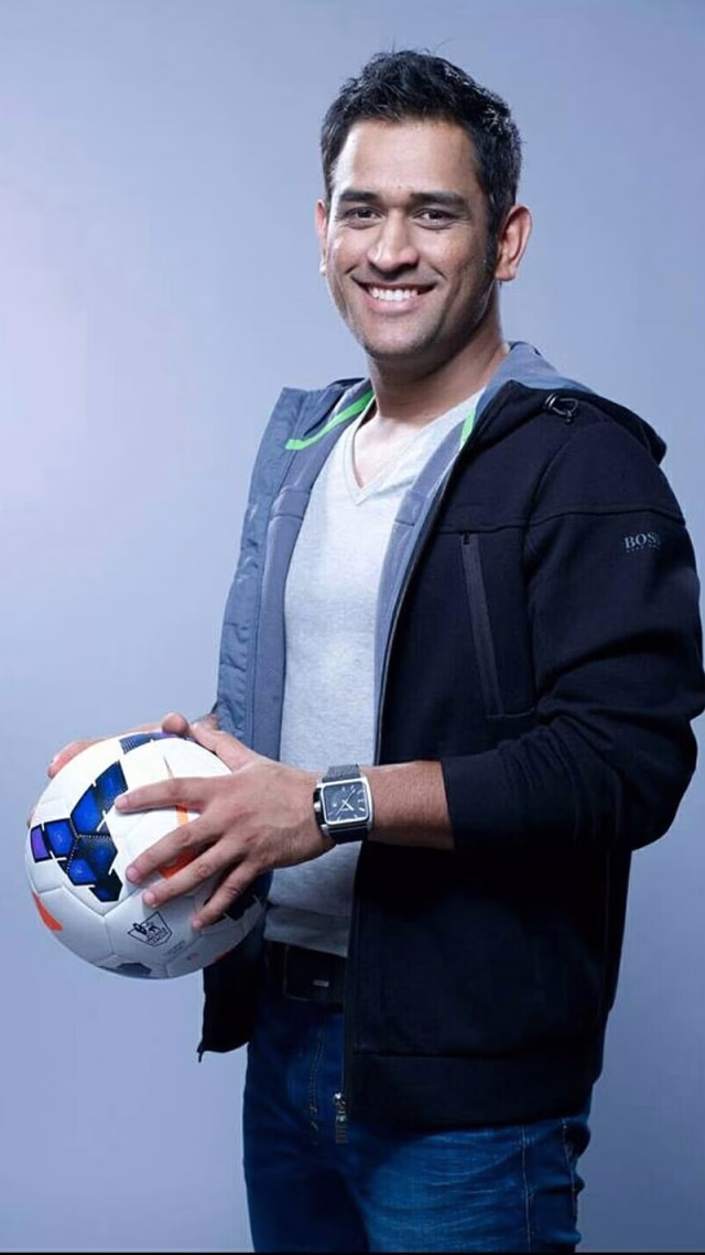 HD-wallpaper-dhoni-with-football-in-hand-dhoni-football-smile-sportsmen-ms-dhoni
