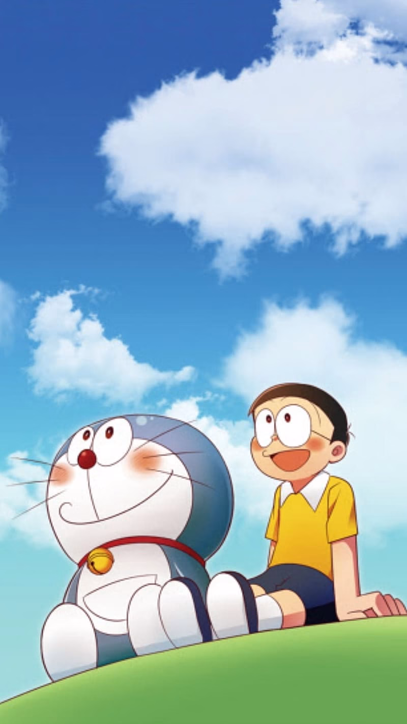 HD-wallpaper-doraemon-with-clouds-background-doraemon-clouds-background-nobita-sitting-cartoon-animated