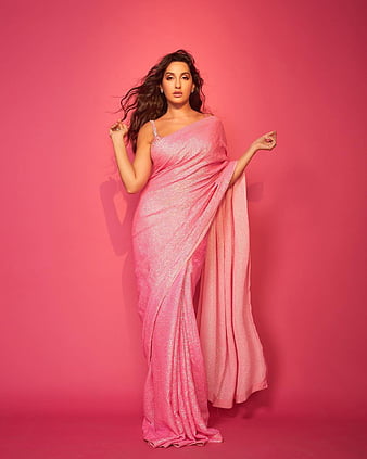 HD-wallpaper-nora-fatehi-dress-hair-thumbnail
