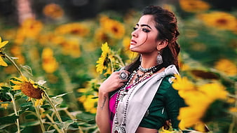 HD-wallpaper-rashmika-mandanna-is-standing-in-the-middle-of-sunflower-field-wearing-colorful-saree-girls-thumbnail