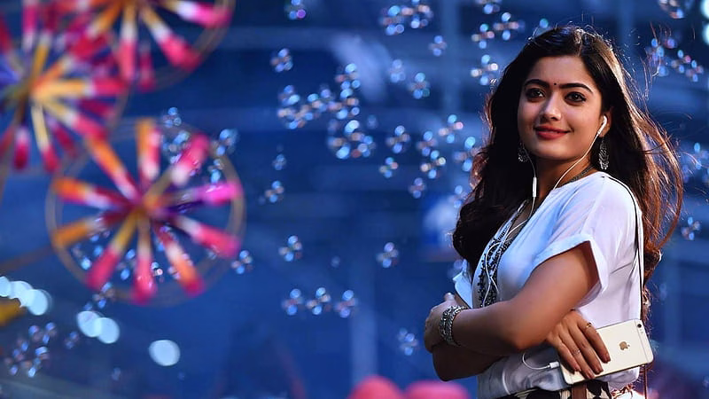HD-wallpaper-rashmika-mandanna-is-wearing-white-black-dress-with-headphones-girls