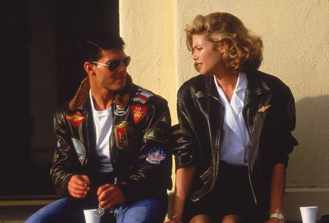 HD-wallpaper-top-gun-1986-charlie-maverick-movie-kelly-mcgillis-man-tom-cruise-woman-actress-top-gun-couple-actor