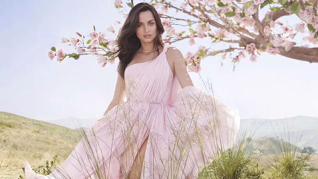 HD-wallpaper-actress-ana-de-armas-is-wearing-pink-dress-standing-in-blur-mountain-background-girls