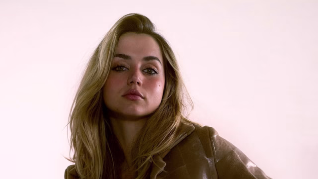 HD-wallpaper-cute-look-of-ana-de-armas-with-blonde-hair-and-brown-eyes-in-pink-background-ana-de-armas