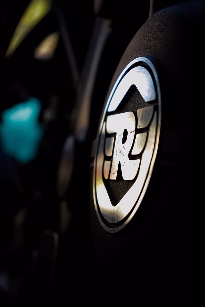 HD-wallpaper-royal-enfield-logo-bike-bike-engine-engine-himalayan-himalayan-logo-hot-royal-enfield