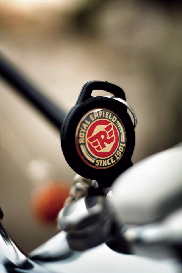 HD-wallpaper-royal-enfield-logo-road